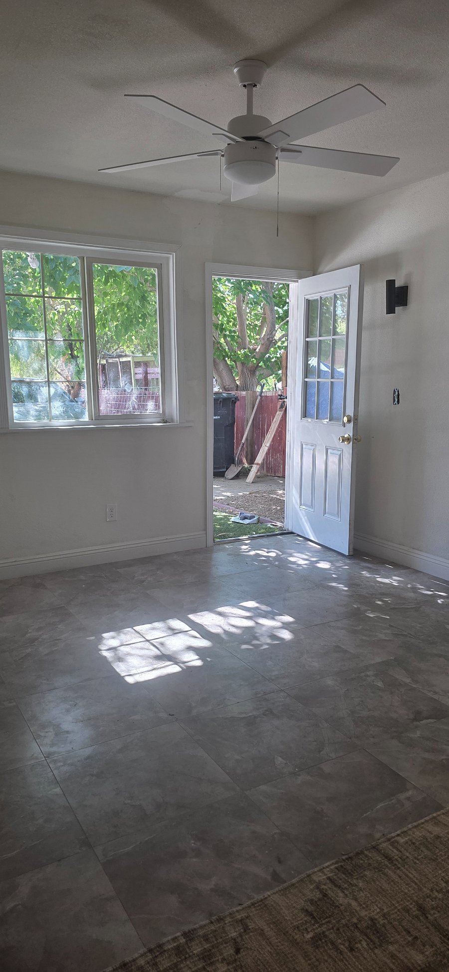 Front, driveway.l, Big room, quiet, birds chirping in big tree.