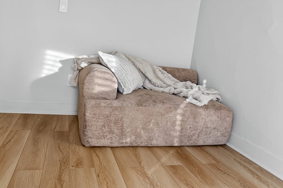 Bedroom 3 enjoy a cloud modular sofa chair, offering a spacious and inviting retreat.