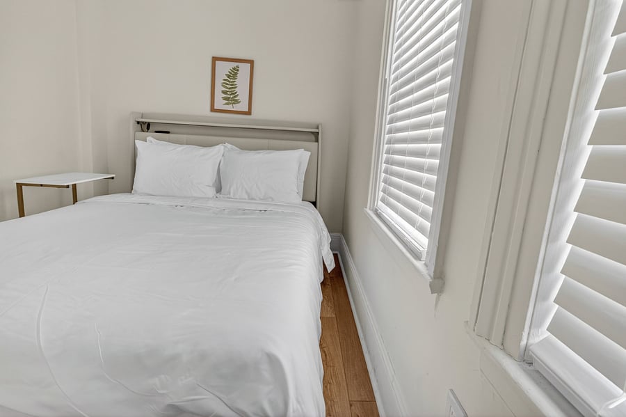 Bedroom 1 is located on the first floor and, while the smallest of the three bedrooms, offers a cozy and inviting space ideal for a comfortable stay.