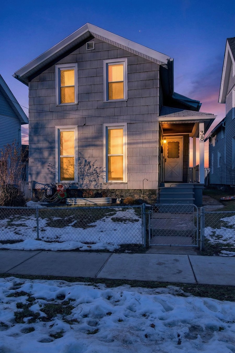 Exterior view of the property showcasing the front faade, entryway, and overall curb appeal.