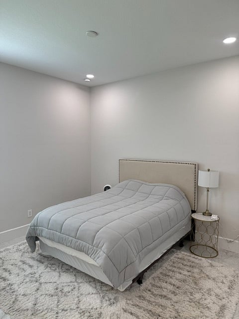 Private bedroom with queen bed and ensuite bathroom--quiet, comfortable, and designed for rest