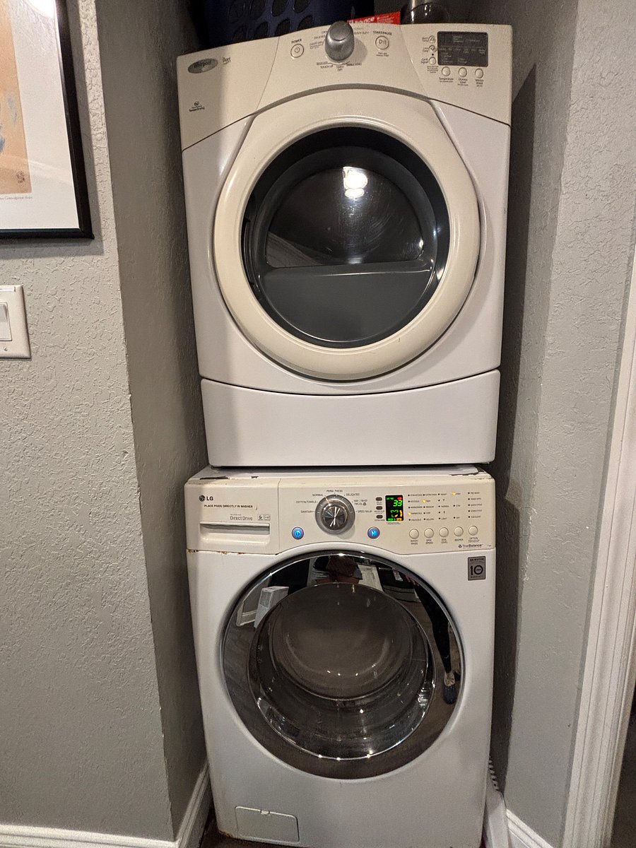Full size stackable washer /dryer off kitchen