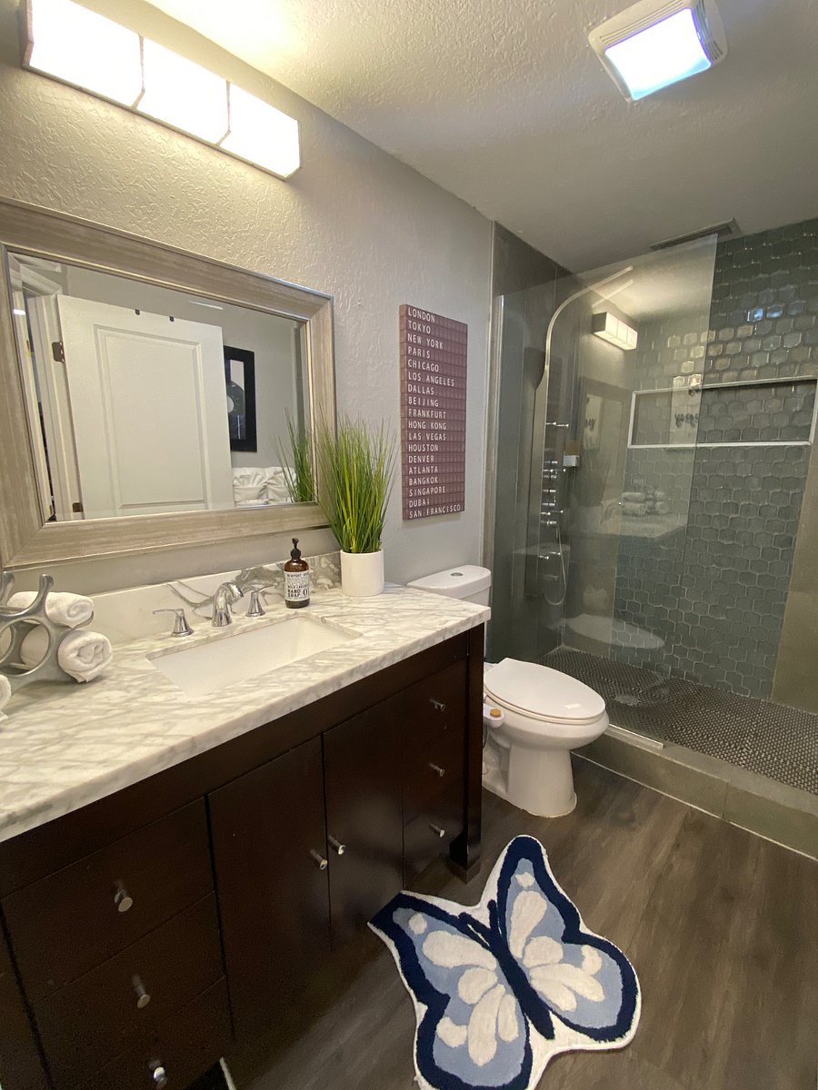 Bathroom has a walk In shower, bidet and towels provided