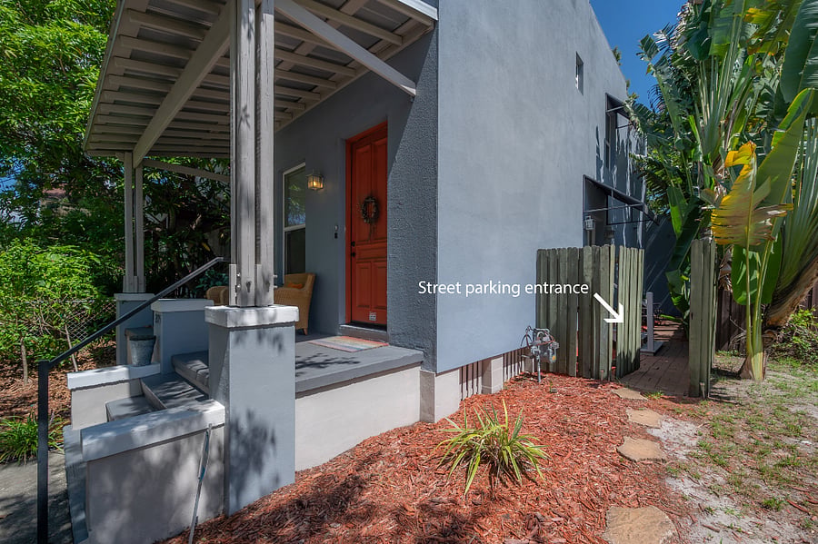 One way to enter the garage studio courtyard is from the front of the main house enter through the privacy fence on the east side of the main house