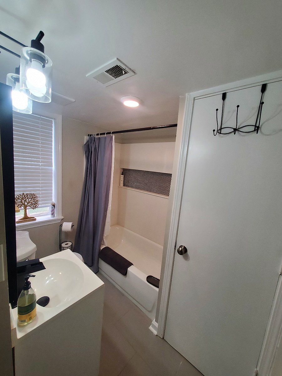 Full bathroom and storage.