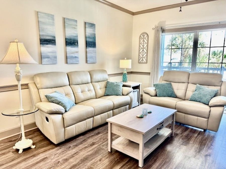 The reclining leather sofa and loveseat are very comfortable.