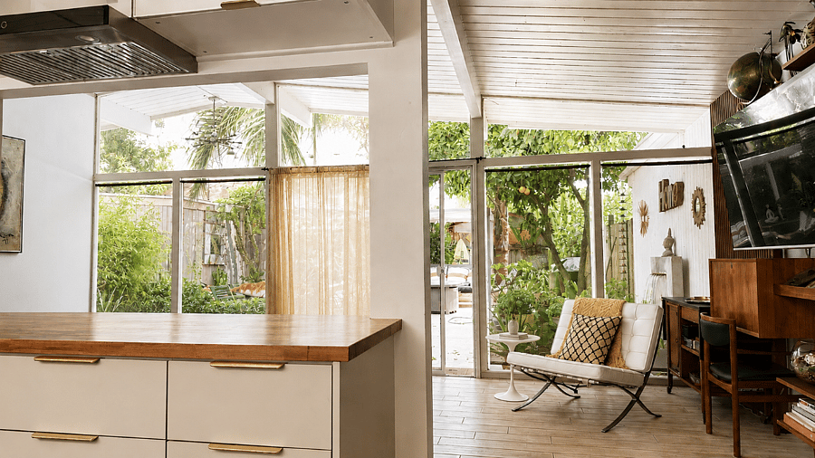 Seamless indoor-outdoor living extends from the kitchen to the garden.