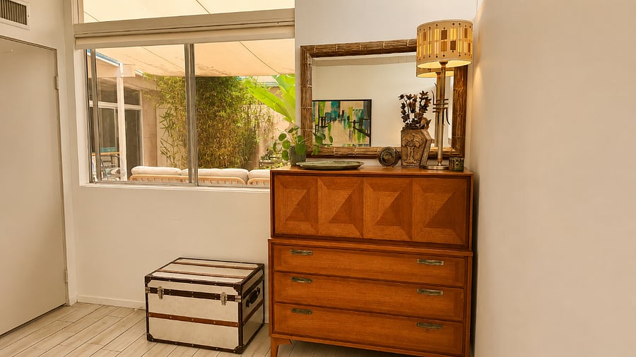 Beautiful mid-century furnishings complete this relaxing guest retreat.