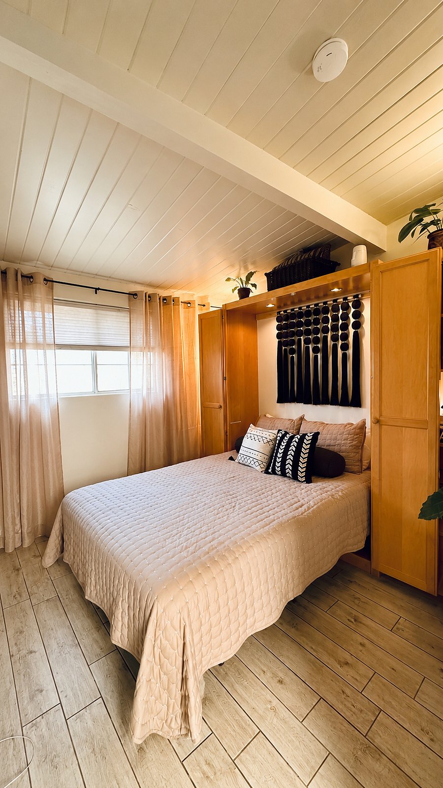 The comfortable Murphy bed folds down in seconds for a restful night's sleep.