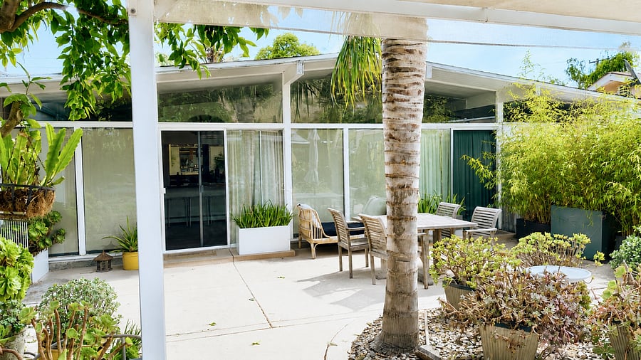 Walls of glass blur the line between indoors and out.
