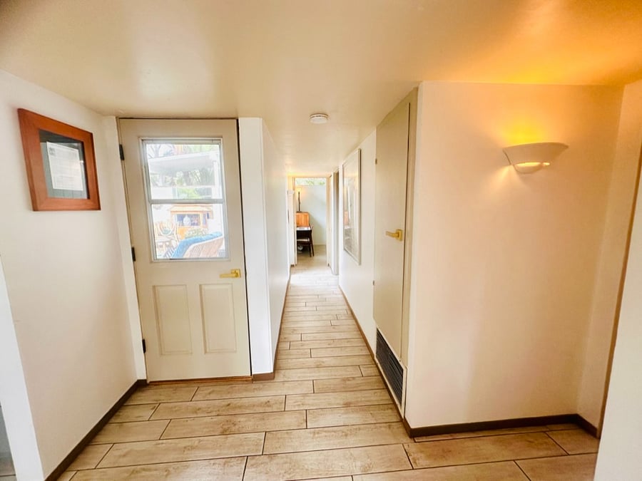 At the opposite end of the hallway is the guest suite.