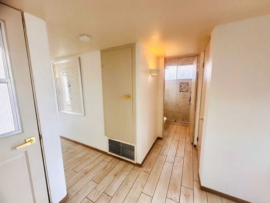 Hallway leading to bathroom.