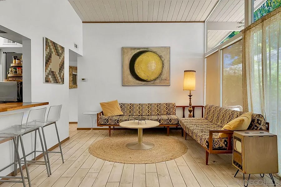 Relax in a comfortable gathering space that flows effortlessly into the dining area.