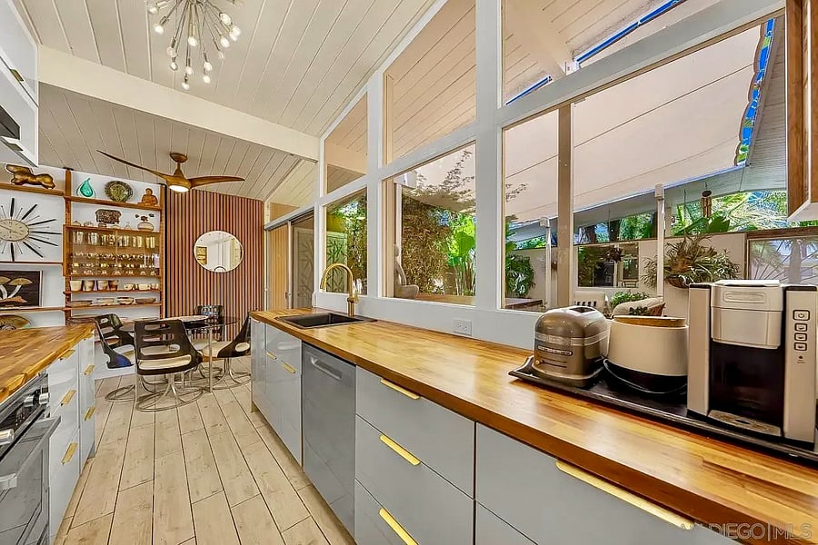 The kitchen, dining, and living spaces were designed for easy entertaining.