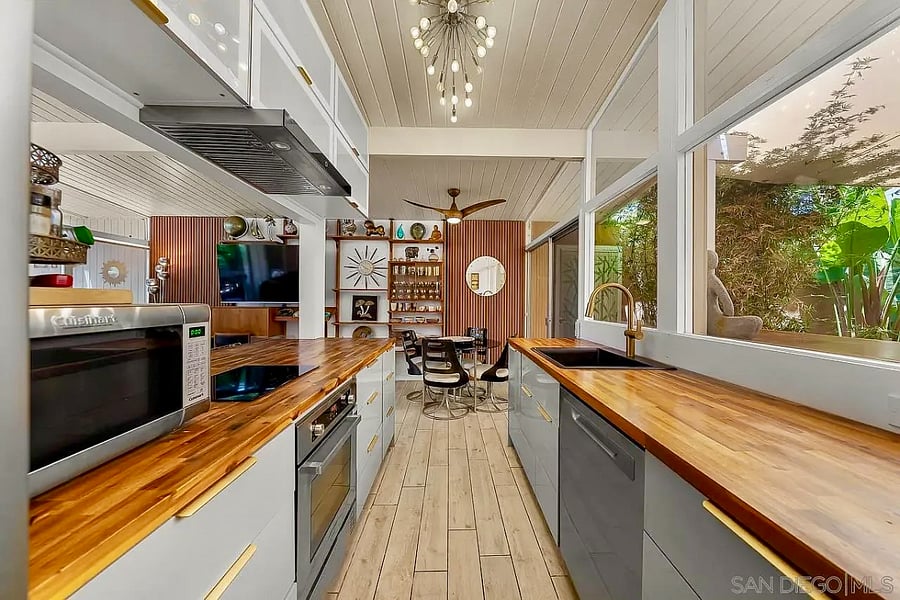 Warm butcher block countertops add character and function.