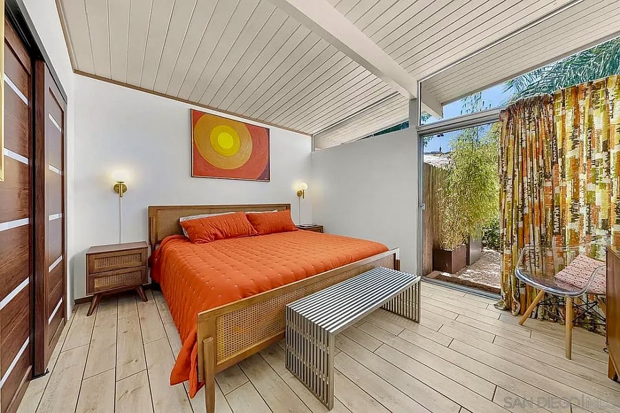 The serene primary suite is designed for rest and relaxation.