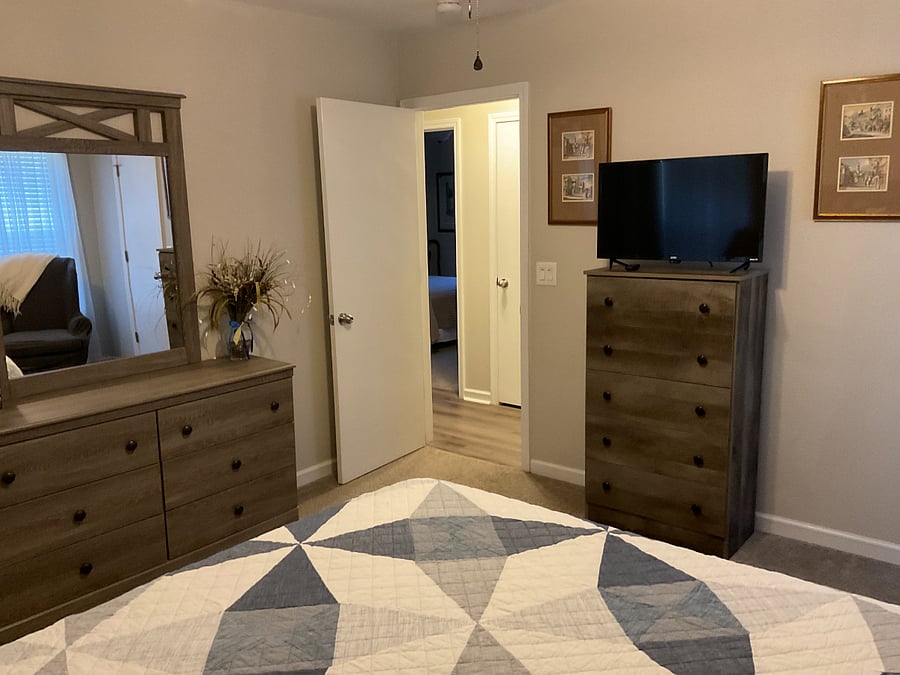 Master bedroom leads to en-suite bathroom. 
