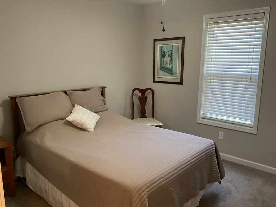 3rd bedroom with a full bed. Room includes chest of drawers, nightstand, TV (24") and closet.