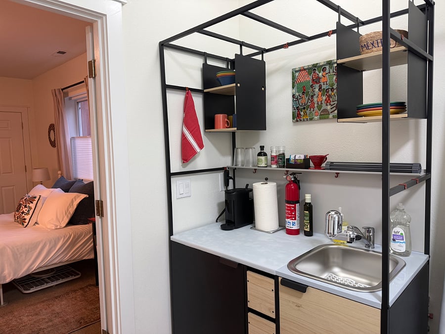Kitchenette adjacent to bedroom.
