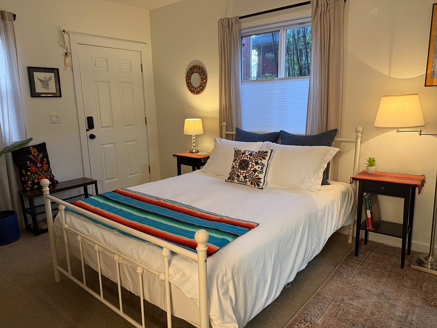 Guest suite gets lots of beautiful natural light. Windows are furnished with blinds and curtains. Blackout curtains available upon request.