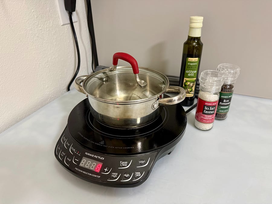 Kitchen essentials, like pots and pans, are provided.