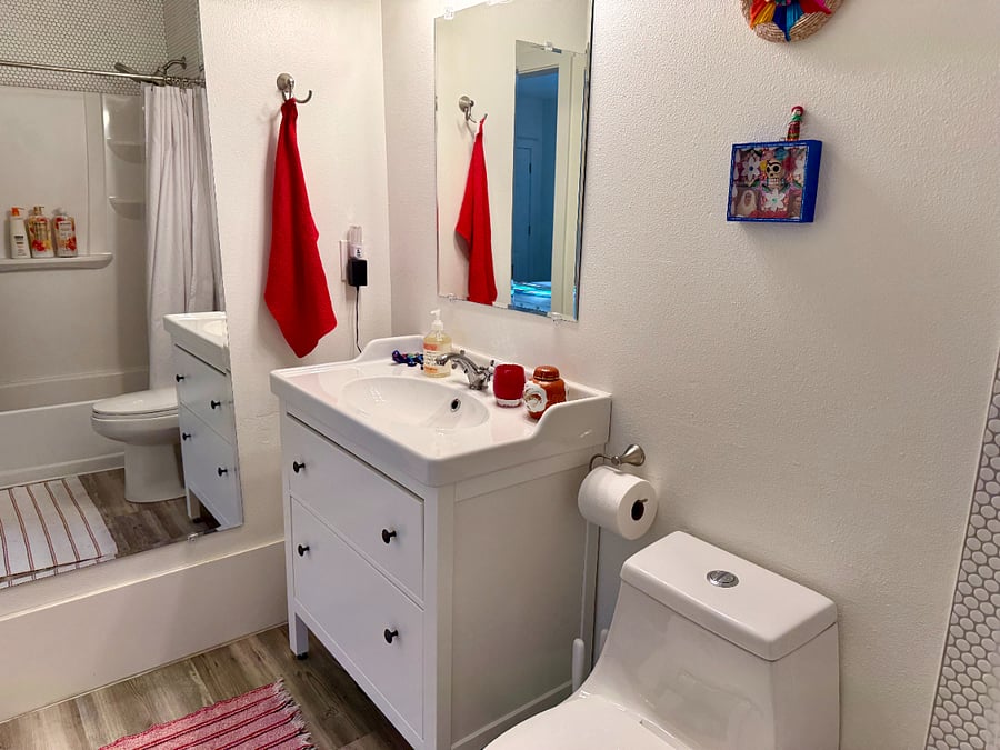 Lots of storage in bath vanity. Hairdryer and bathroom cleaning supplies are provided.