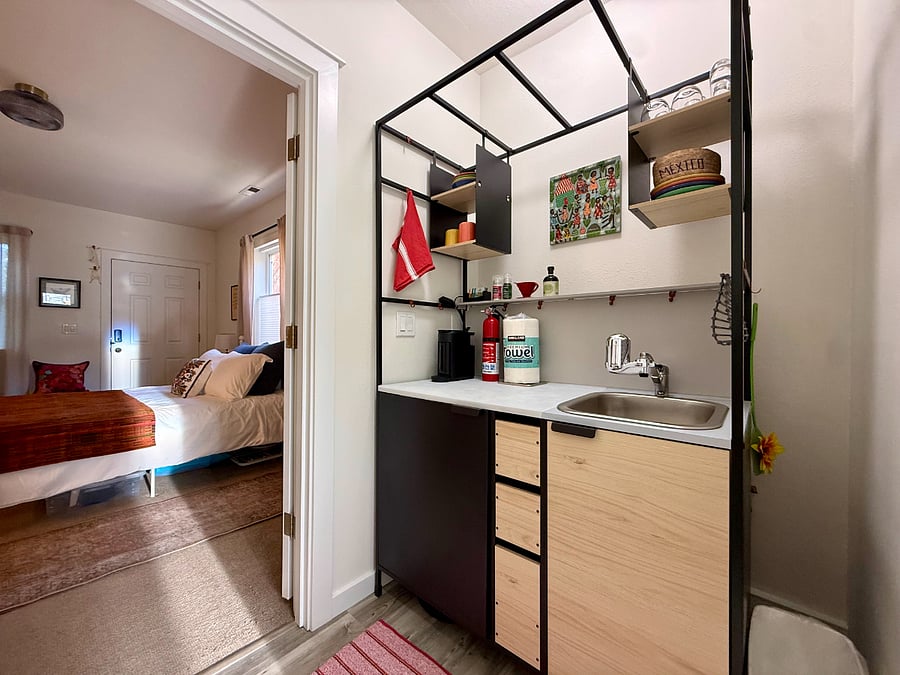 Kitchenette adjacent to bedroom.