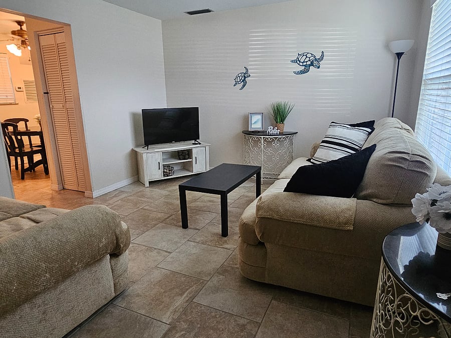 living room with comfortable sofa and loveseat