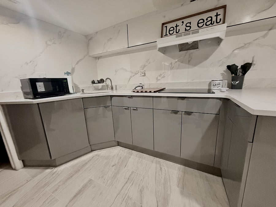Brand new kitchen with electric range top, toaster oven,  microwave and air fryer upon request. 