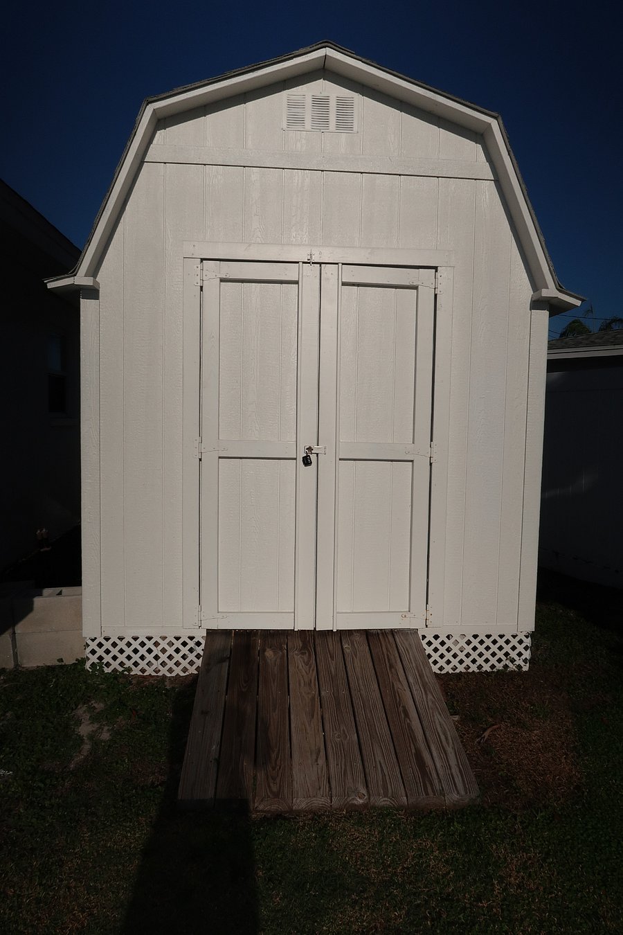 Storage Shed located on side of home