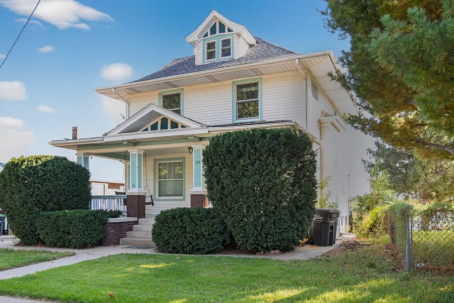 Charming wooden home on Pine Street, Omaha. Classic architecture meets cozy hospitality.