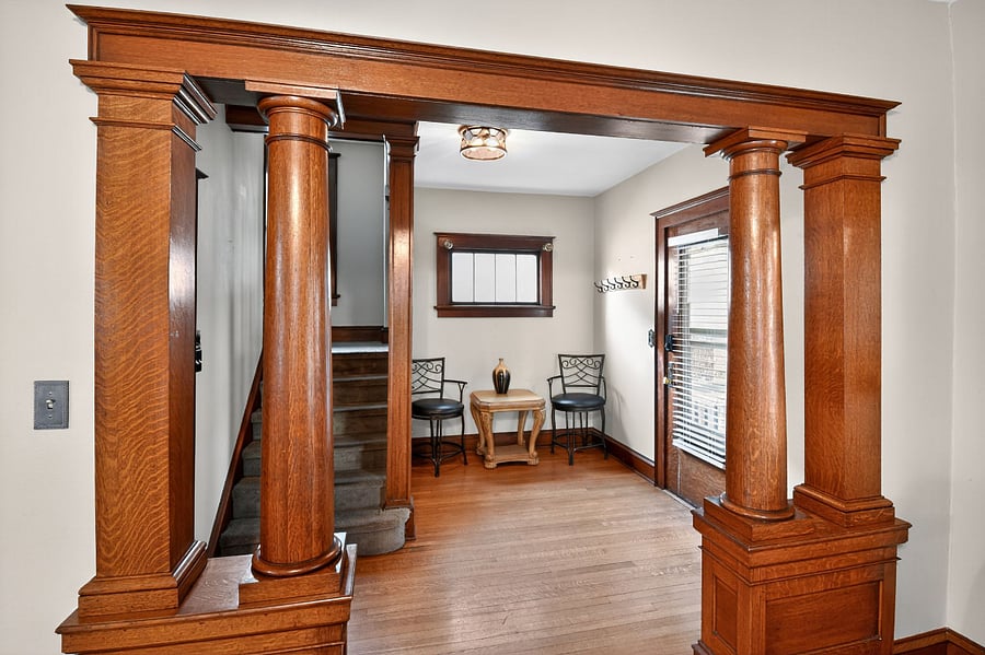 Bright and cozy lounge at our Pine Street home, blending old-world wood charm with modern comfort