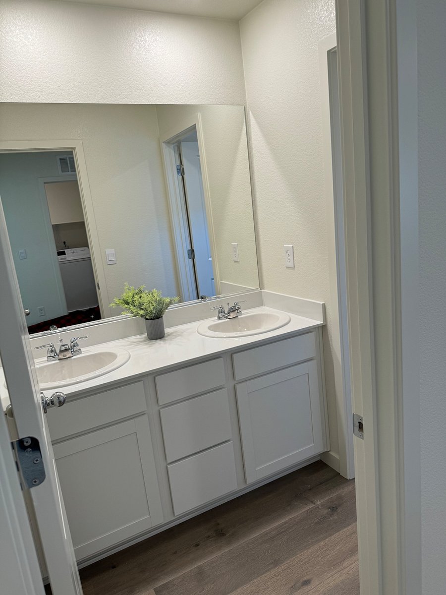upstairs shared bathroom with tub and shower.