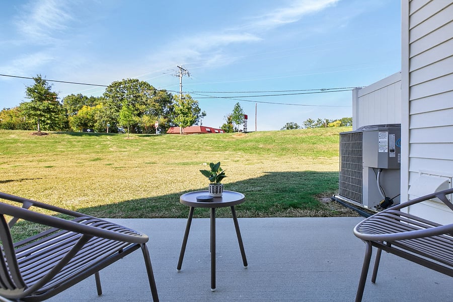 Step outside to a serene backyard. Perfect for morning coffee, evening drinks, or letting the kids play.