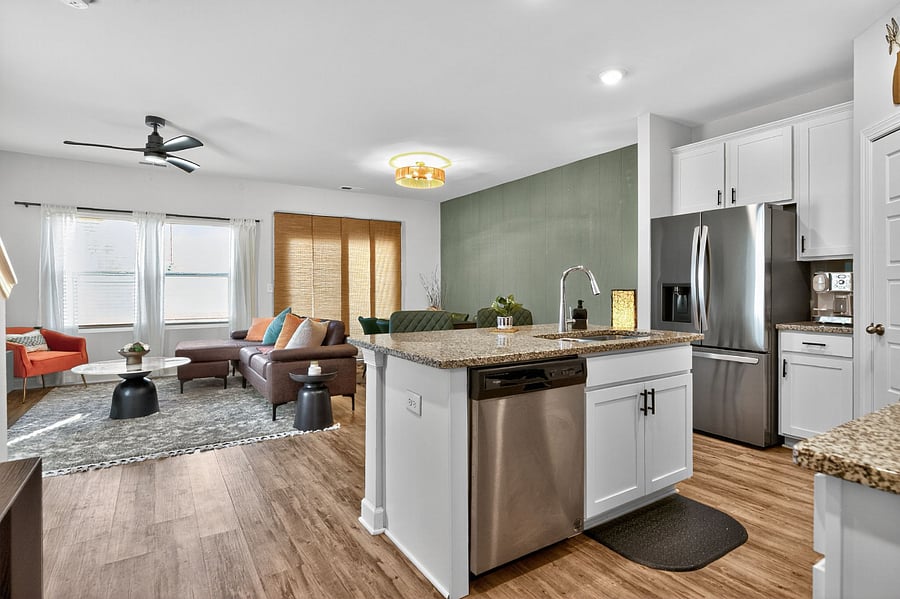 Ample counter space, sleek cabinetry, and modern conveniences make meal prep a pleasure during your stay.