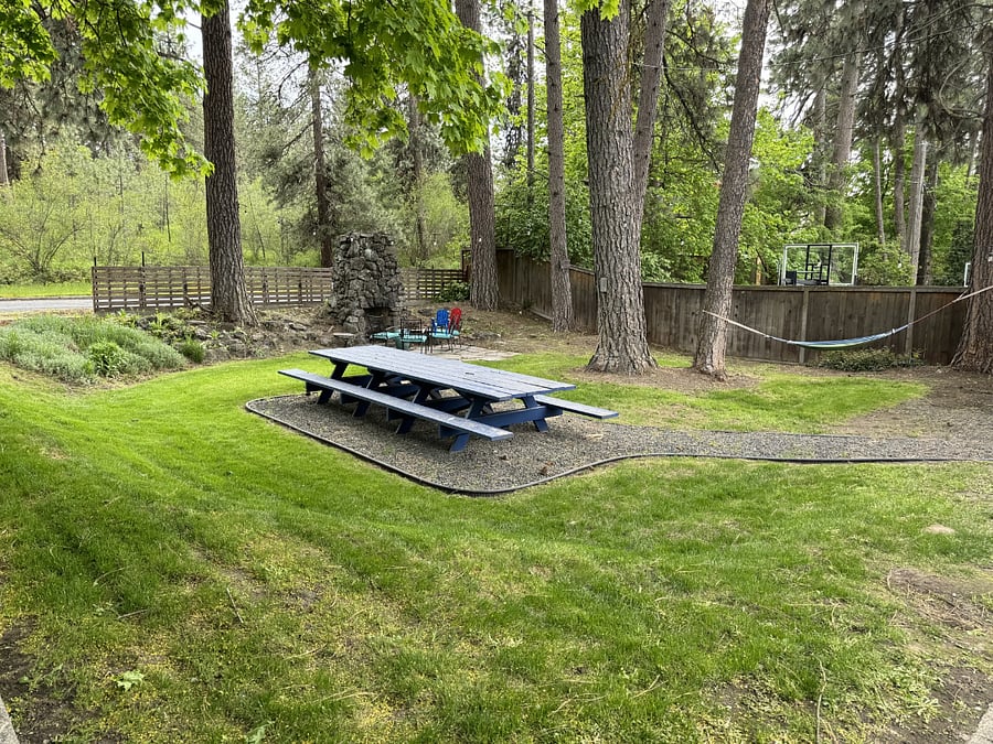 Backyard with table & fireplace