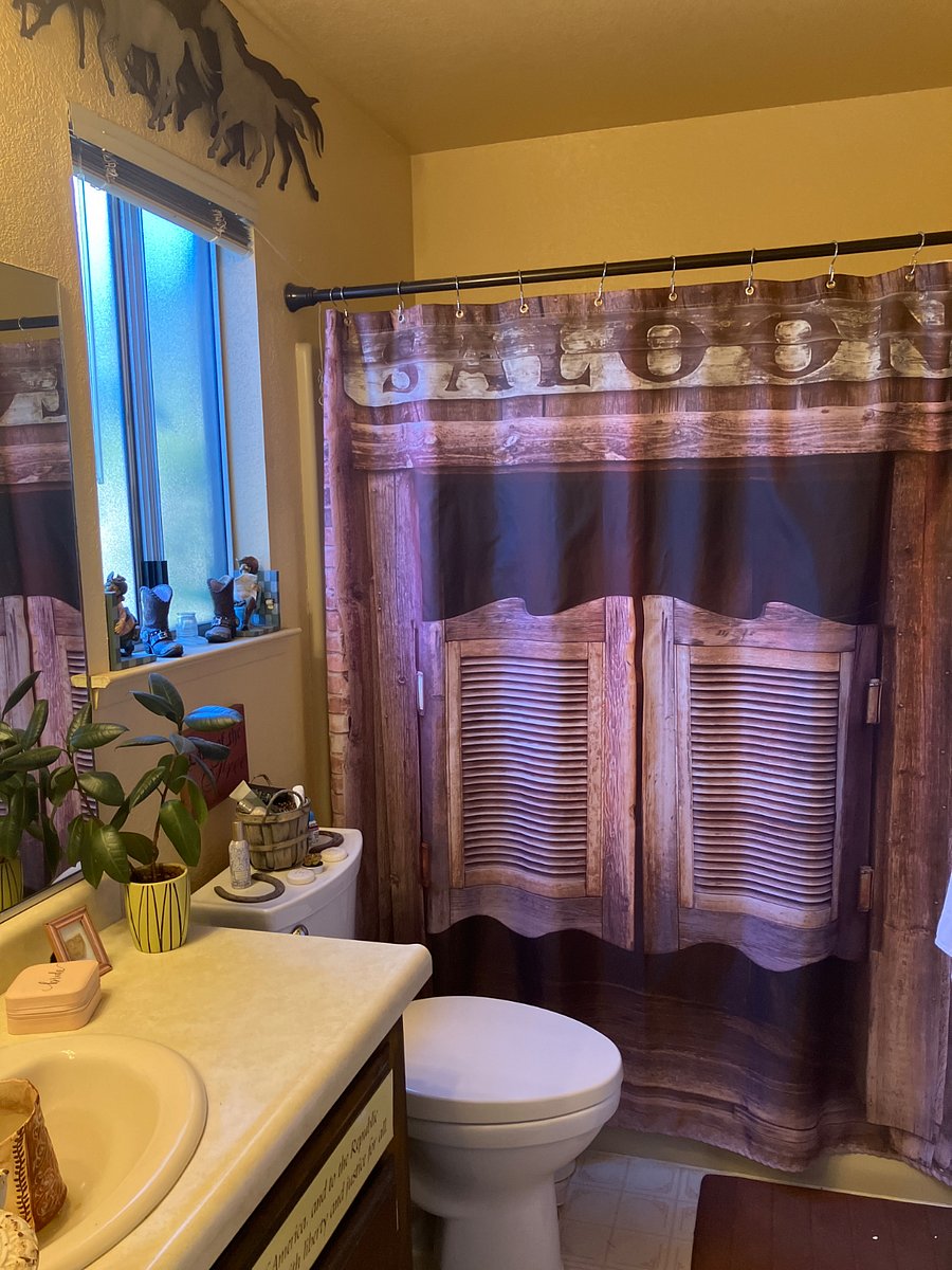 This is a western style decorated bathroom in the master bedroom