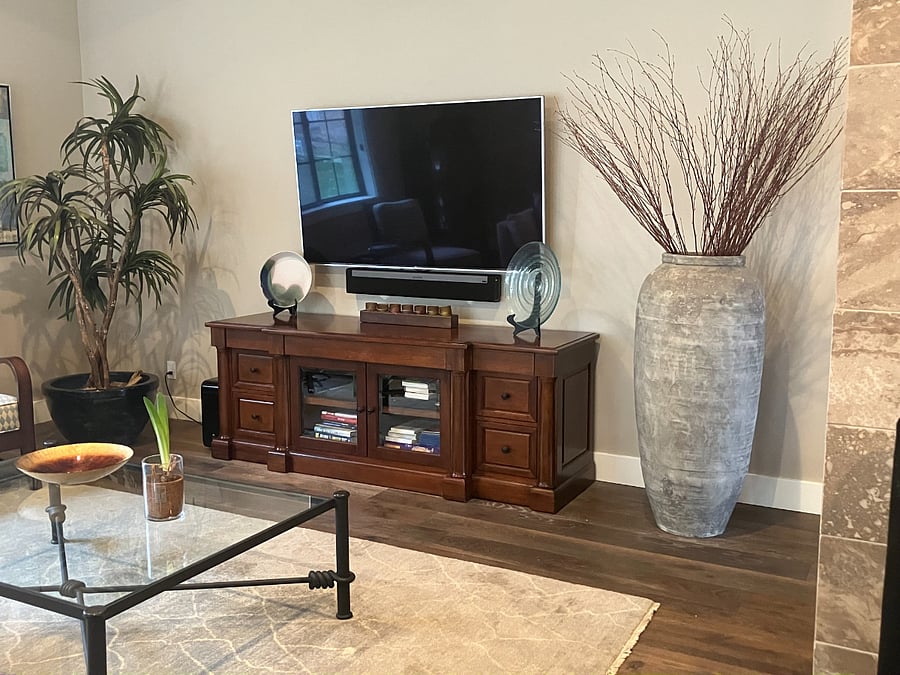 living room includes a 65" LG Smart TV