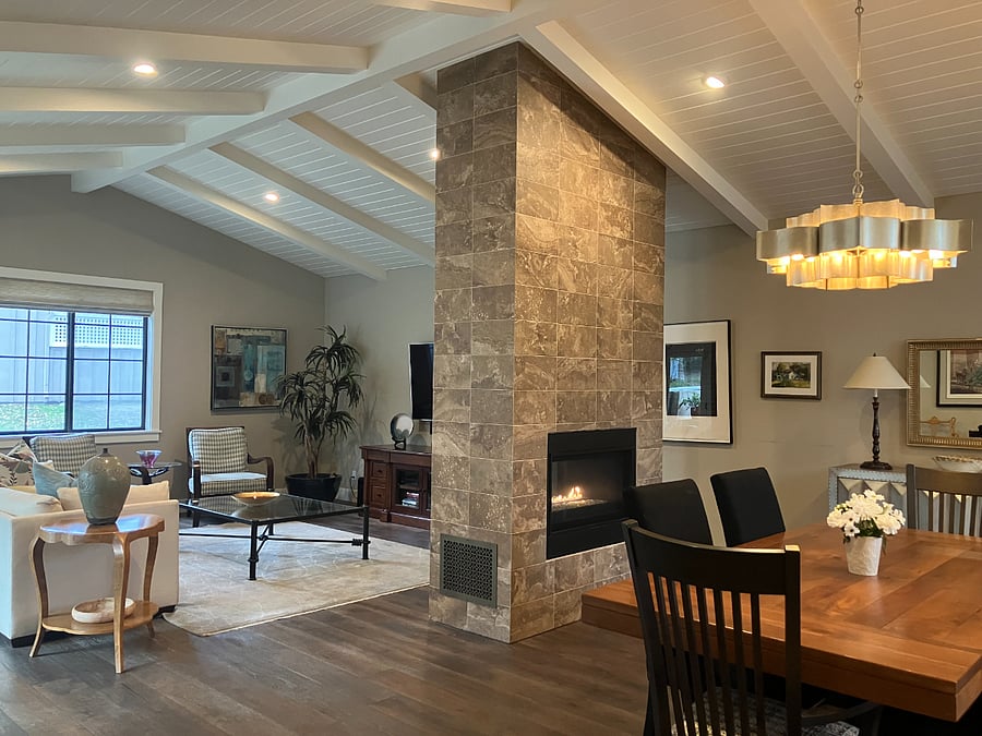 dining and entertaining/relaxing are separated by the fireplace