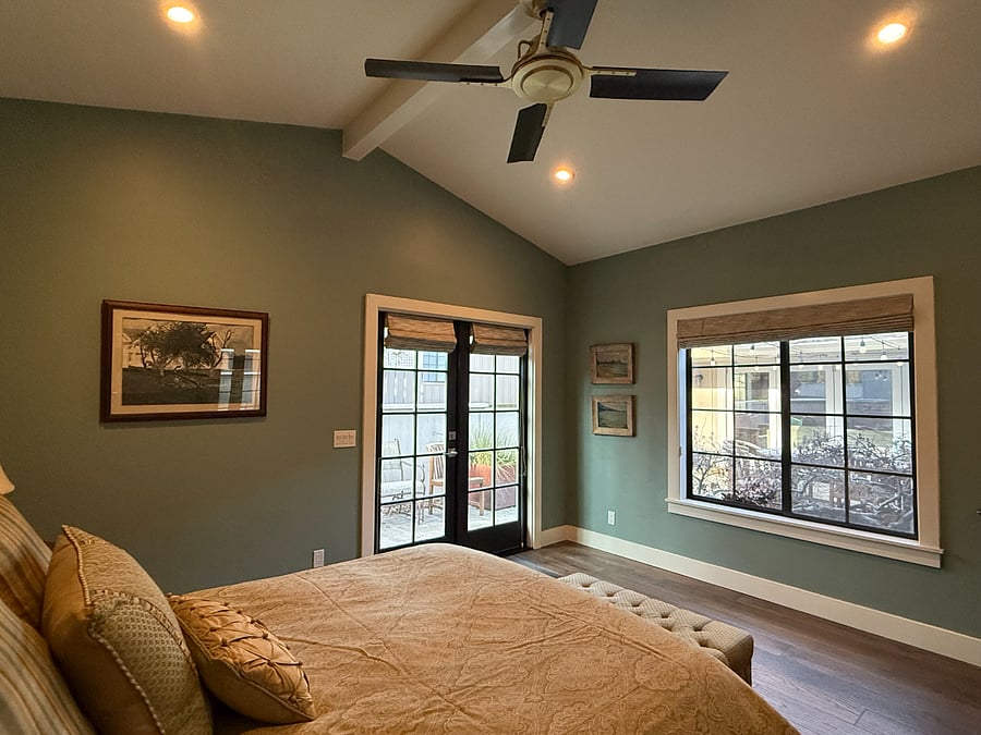 with windows and French doors there is plenty of light in the daytime