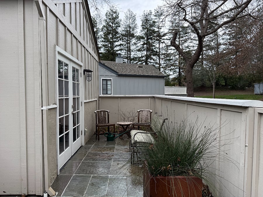 Private corner off the primary bedroom in the back courtyard