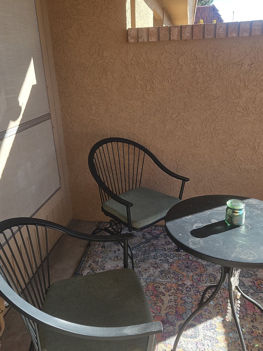 Front Piriate Patio, gets sun and has a sun shade for hot days
