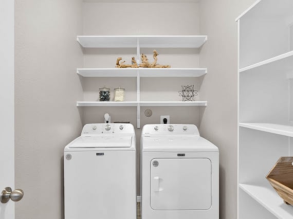 Full size washer and dryer, cleaning supplies and laundry detergent/fabric softener available.