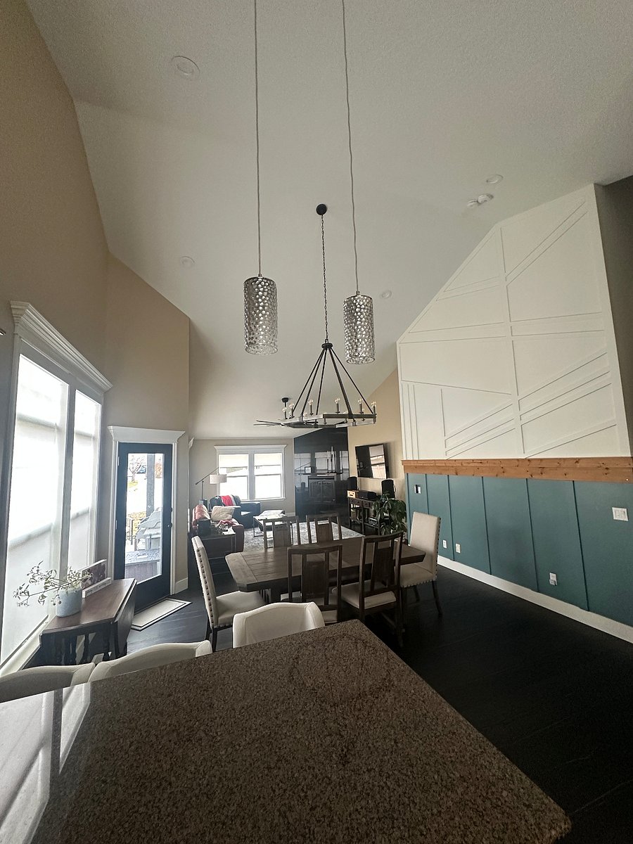 Wide angle shot of living & dining rooms on 1st floor
