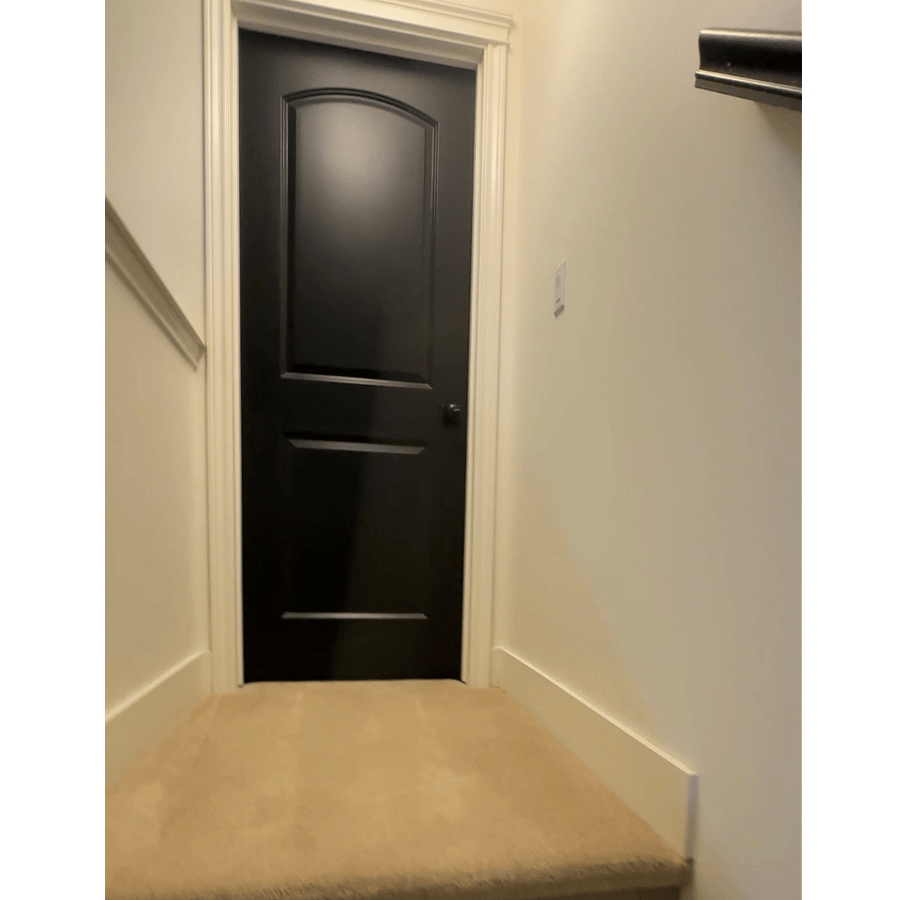 Private solid wood entry door to renter's suite with individually keyed lock
