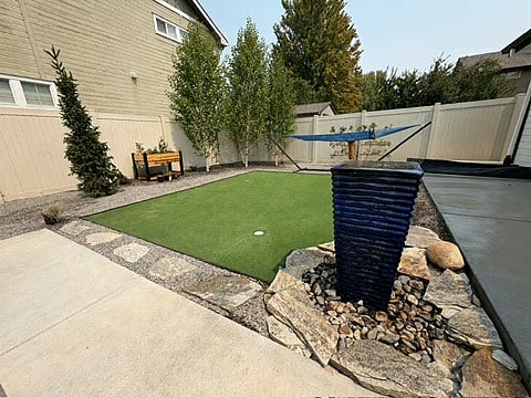 Backyard includes brand new 3-hole putting green, BBQ, outdoor dining and patio furniture.