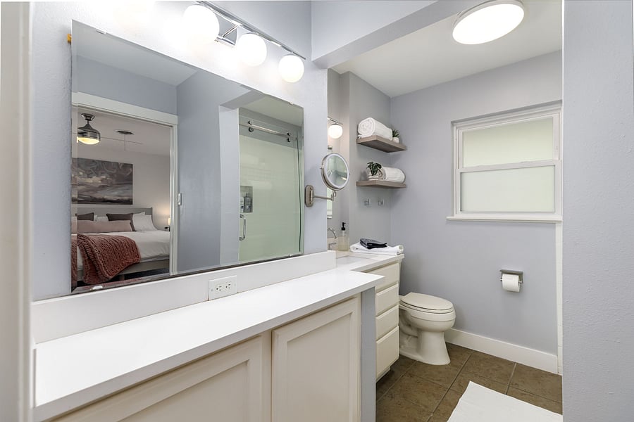 A spacious vanity, ambulant mirrors, and excellent lightingthis master bathroom has everything you need to get ready for all Austin has to offer.