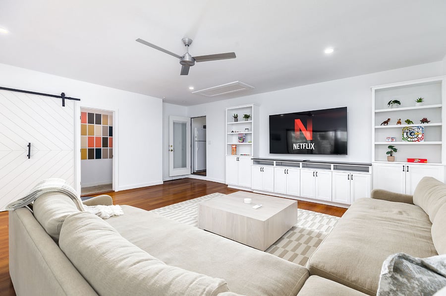 Movie night, anyone? Kick back on the oversized sectional and stream your favorite shows on the massive smart TV.