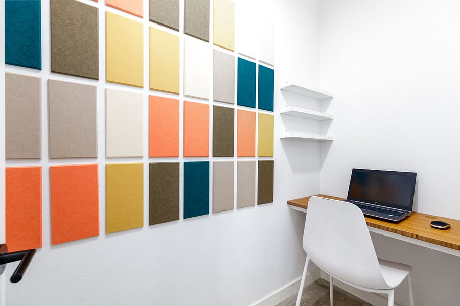 Need to sneak in a few emails? This private workspace with funky sound panels makes remote work feel less like work.