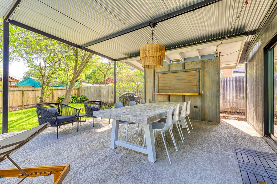Gather for meals, drinks, or laughs with friendsthis covered patio is perfect for al fresco dining, Austin-style.